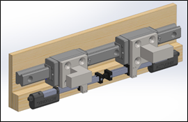UDIG anchorage dock design rendering showing two lateral facing anchor hooks that deploy using a two smaller actuators.