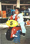 photo of a girl on a spring rocker