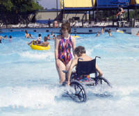 photo of individual entering a wave action
pool