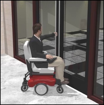 Person using power chair opening entrance door
