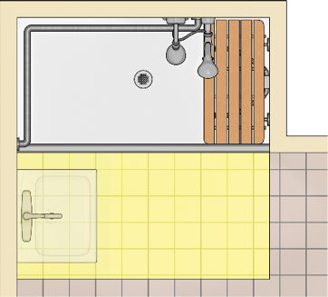 Lavatory overlapping the clear floor space at roll-in shower on the
side farther from the seat.