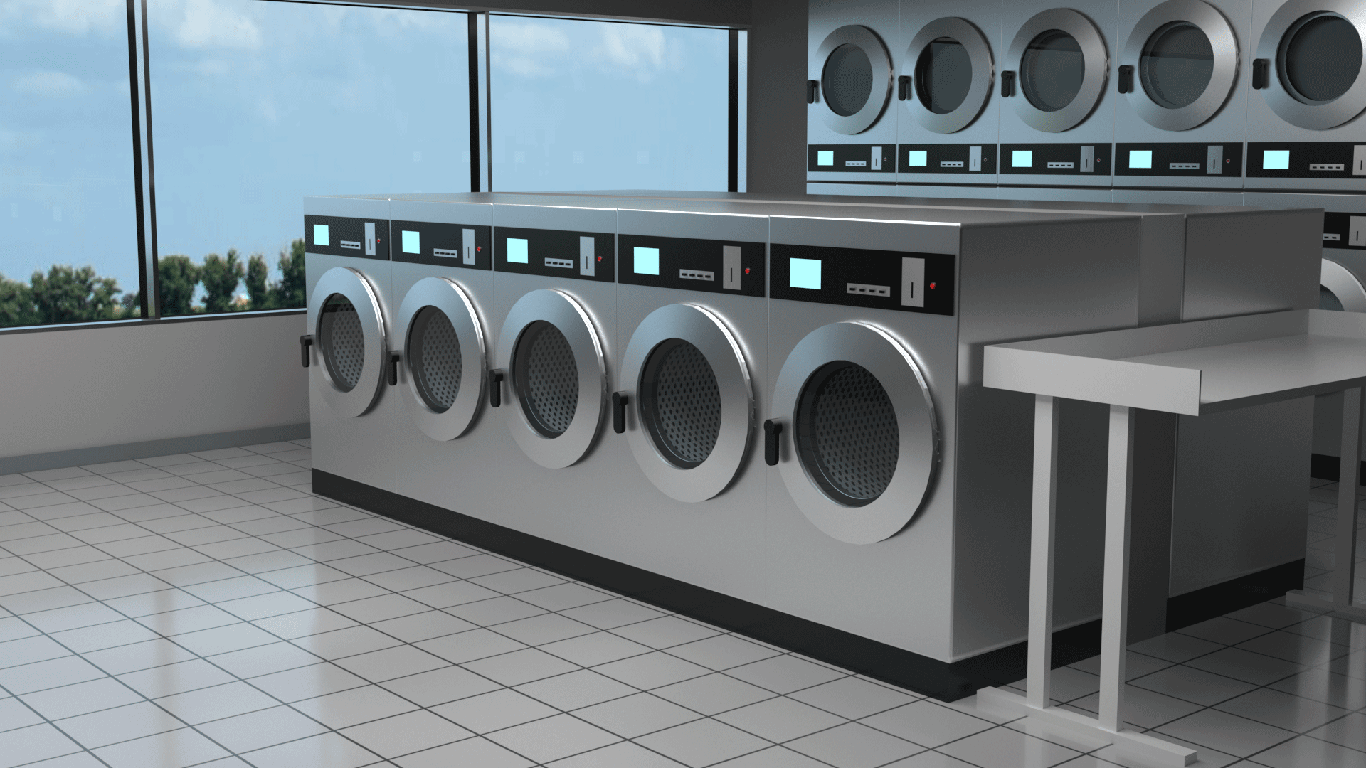A laundromat showing an area with washers at ground level and additional raised machines in the background.