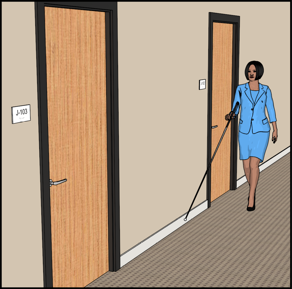 Woman with long white cane walking along hallway with doors.  Each door is labeled with an adjacent sign.