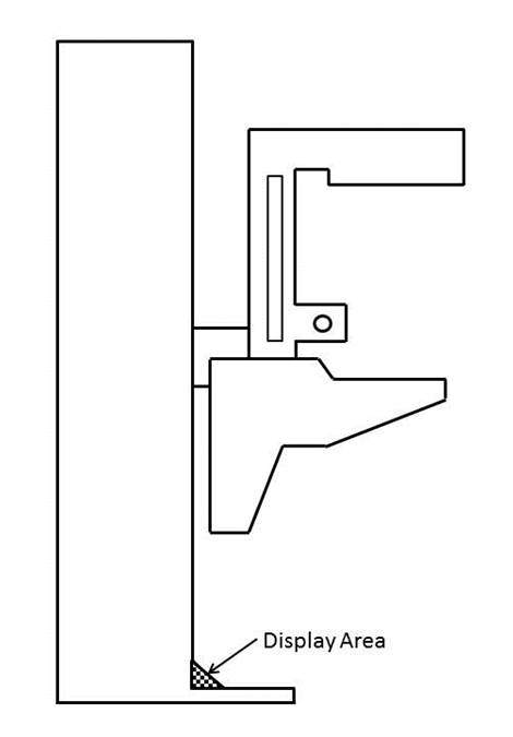 Side view of mammography equipment showing display area located under breast platform on top of the base support.