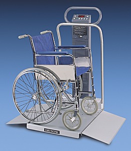 Picture of a manual wheelchair seated on the platform of a dual ramp scale.