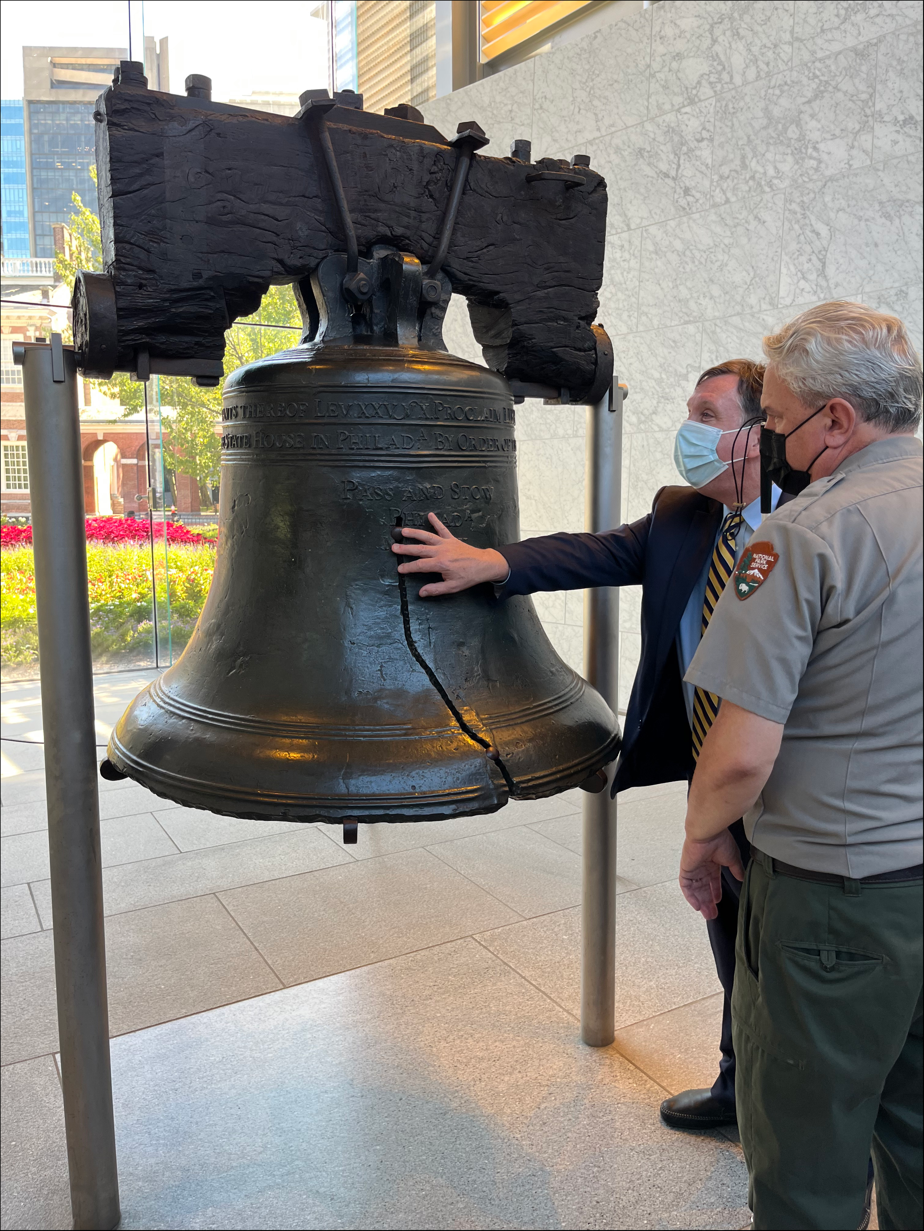 Access Board General Counsel Chris Kuczynski touching the Liberty Bell
