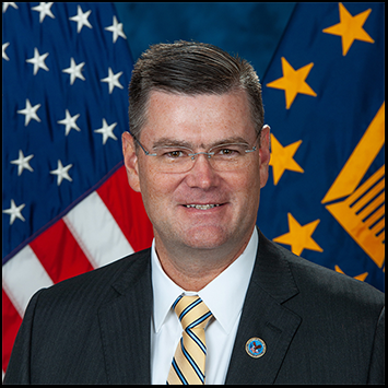 Headshot of Michael Brennan.