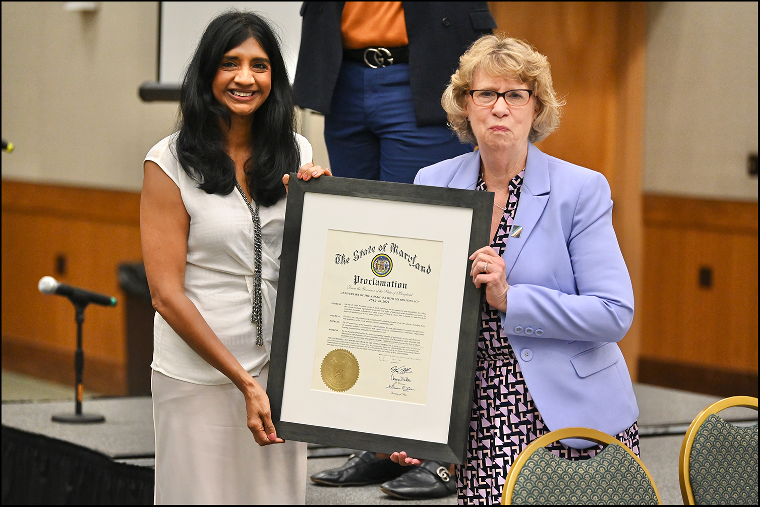 Maryland Lieutenant Governor Aruna Miller presents the Governor’s proclamation to Maryland Department of Disabilities Secretary Carol Beatty.